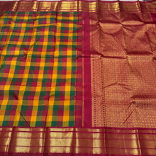Gorgeous Palum Pazhamum Checks in a beautiful Korvai Handwoven Pure Jari Kanjivaram Silk Saree with very intricately woven vanki borders and inbetween mayilkan motifs woven with rich and finely woven pallu in arakku with laksham buttas and contrast blouse