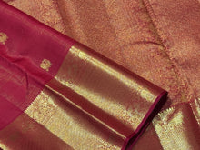 Red with Gold Vairaoosi with Mayil Chakram motifs with broad borders rich pallu and self blouse in a beautifully handwoven kanjivaram silk saree