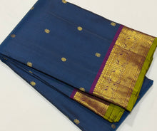 Sahana- Deep Sapphire Blue with Plum Purple Buttas Handwoven Pure Jari Kanjivaram Silk with gorgeous gandaberundas woven borders with green selvedges rich pallu and contrast woven blouse