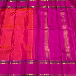 Double tone Orange with Pink with Mallimoggu Buttas and Doublepet Borders in a Handwoven Pure Kanjivaram Silk Saree Beauty