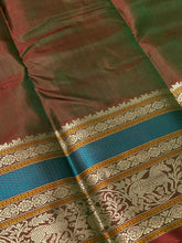 Dark Bottle Green with Manthulir buttas with Corner Buttas Konia Pallu with Varisaipet borders Handwoven Pure Zariless Kanchipuram Silk Saree Beauty