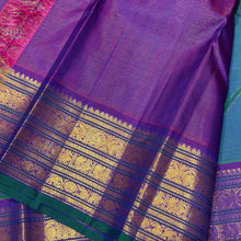 Sahana- Gorgeous Peacock Bluish Green with Purple Handwoven Pure Jari Kanjivaram Silk with Vairaoosi with buttas woven beautiful body with varisaipet borders with green selvedges rich pallu and contrast woven blouse