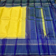 Stunning Lemon Yellow with Deep Peacock Blue Handwoven Pure Korvai Zariless Kanjivaram Silk Saree with temples woven borders classy pallu and contrast woven blouse