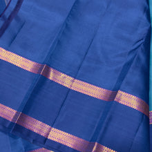 Sahana- Beautiful Blue with dark teal blue combination in a handwoven pure Jari Kanjivaram Silk with buttas woven body with rich borders beautiful pallu and contrast woven blouse