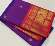 Sahana- Gorgeous Purple with Dual tone Orange Pink Handwoven Pure Jari Kanjivaram Silk with mayil chakram buttas woven body with rich elephants woven borders gorgeous pallu and contrast woven blouse