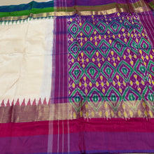 Arabhi- Stunning Offwhite with Ganga Jamuna temples Handwoven Pure Double Ikat Silk with beautiful borders with rich ikat style woven beautiful pallu with contrast blouse