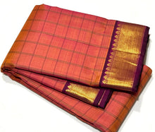 Dual tone Orange mixed with deep magenta  Handwoven Pure Jari muthukattam woven Kanjivaram with rich borders pallu and contrast woven blouse beauty