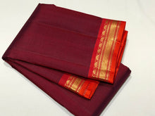 Nayaki- Beautiful Maroon with Orange  Handwoven Pure Kanjivaram Silk with Plain body with small temples woven beautiful borders rich seer pallu and contrast woven blouse