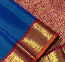 Sarasangi- Gorgeous Peacock Blue with Arakku Red Handwoven Pure Jari Korvai Kanjivaram Silk with beautiful borders with orange selvedges rich pallu and contrast woven blouse