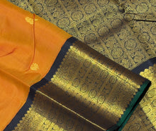 Vaibhogam- Stunning Rust with Black Handwoven Pure 2g Jari Korvai Kanjivaram Silk with mayil kuyil bird buttas with rich borders gorgeous pallu and contrast woven blouse