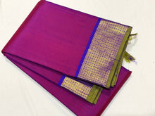 Dual tone Purple shade with Meenakshi Blue with Rudraksha pet borders rich pallu and contrast woven blouse