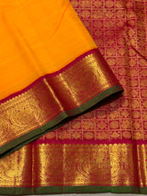Sarasangi- Vintage Style Mambazham Yellow with Arakku Handwoven Pure 2g Jari Korvi Kanjivaram Silk with Green Selvedges with beautiful gandaberundas woven borders rich pallu and contrast woven blouse