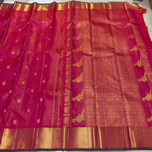 Vaibhogam- Beautiful Dual tone Orange Pink with Green Vairaoosi with Buttas Handwoven Pure Jari Kanjivaram Silk with rich bawanchi borders with green selvedges gorgeous Kalakshetra Kili Pallu and contrast green Jari striped blouse