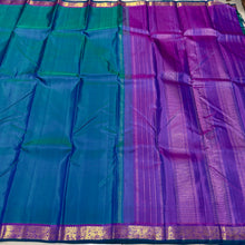 Nayaki- Peacock Blue Green with Purple Handwoven Pure Kanjivaram Silk with small borders rich seer pallu and contrast woven blouse
