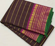Sahana- Gorgeous Coffee Brown with Dark Magenta Handwoven Pure Jari Kanjivaram Silk with Jari Veldhari woven beautiful body with very beautiful borders with green selvedges rich pallu and contrast woven blouse
