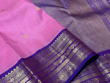 Medium tone Lotus Pink with Violetish Purple Handwoven Pure Silver and Gold twisted Jari Korvai with Buttas Kanjivaram Silk Saree Beauty