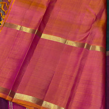 Sahana- Stunning Bottle Green with Ganga Jamuna Borders with buttas with contrast kanakambaram Orange Pallu and blouse in a beautiful Handwoven Pure 2g Jari Kanjivaram Silk Beauty
