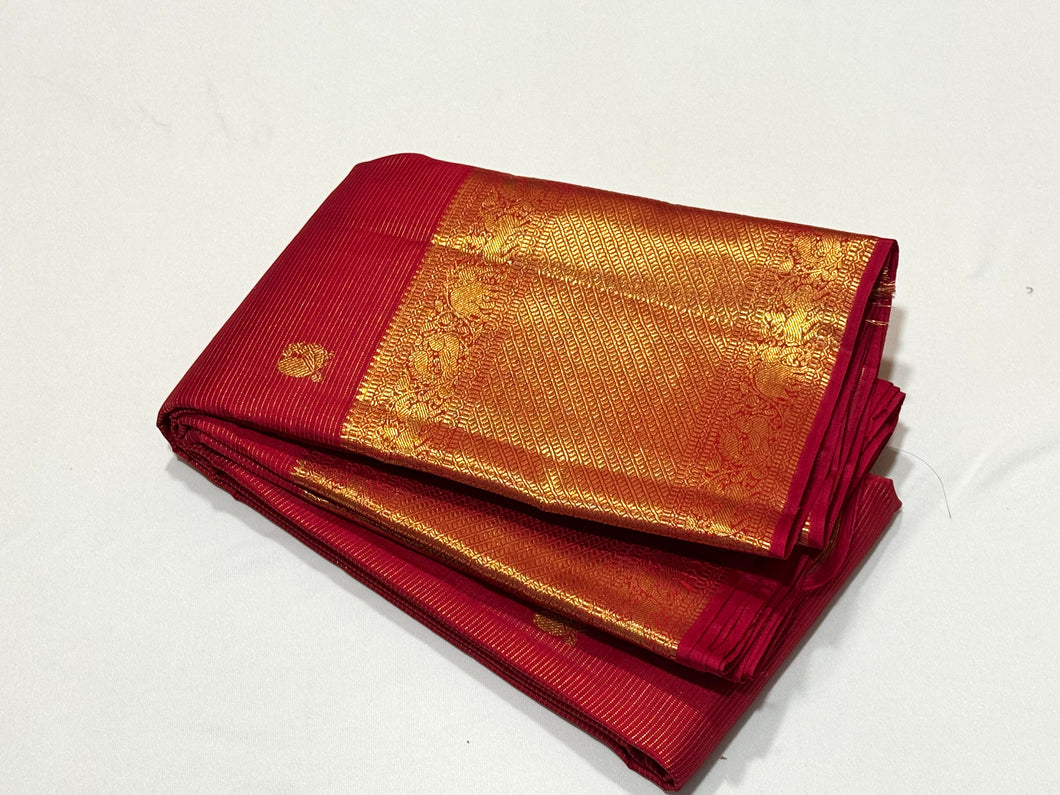 Red with Gold Vairaoosi with Mayil Chakram motifs with broad borders rich pallu and self blouse in a beautifully handwoven kanjivaram silk saree