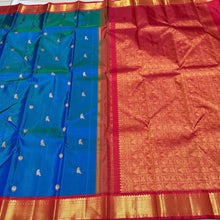 Vaibhogam- Stunning Peacock Blue with Dark Red Handwoven Pure Jari Korvai Kanjivaram Silk with Mayil Kuyil Buttas Woven beautiful body with rich borders veey uniquely woven pallu with elephants flying horses peacocks and contrast woven blouse