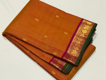 Sahana- Beautiful double tone Mustard with Magenta Shot Arakku Buttas Handwoven Pure Jari Kanjivaram Silk with green selvedges rich pallu and contrast woven blouse
