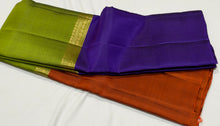 Sahana- Gorgeous Green wjth Purple and Rust Mubbagam Style Handwoven Pure Kanjivaram Silk with beautiful classic borders pallet and contrast woven blouse