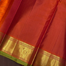 Nayaki- Mesmerizing Manthulir Green with Orange Handwoven Pure Kanjivaram Silk with beautiful bawanchi borders with rich pallu and contrast woven blouse
