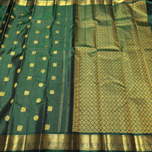 A Deep Emerald Green with Gold Vairaoosi with Buttas Handwoven Pure Jari Kanjivaram Silk Saree with rich borders pallu and self colored blouse beauty