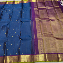 Sahana- Deep Sapphire Blue with Plum Purple Buttas Handwoven Pure Jari Kanjivaram Silk with gorgeous gandaberundas woven borders with green selvedges rich pallu and contrast woven blouse