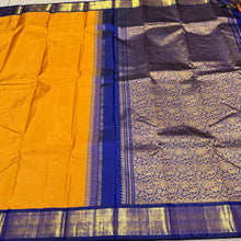 Vaibhogam- Stunning Mustard with MS Blue Buttas Handwoven Pure Jari Korvai Kanjivaram Silk with beautiful borders rich pallu and contrast woven blue blouse beauty