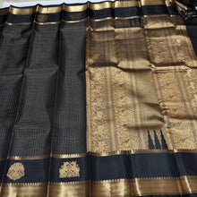 Sahana-Gorgeous Black with Gold Handwoven Pure Kanjivaram Silk with Thematic rettai yazhis and iruthalaipakshis (gandaberundas) motifs woven rich double side borders with beautiful annapakshis and yazhis woven rich pallu and self blouse