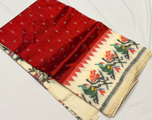 Arabhi- Stunning Rust with Creamish Offwhite Handwoven Premium Zariless Double Ikat with beautiful body with rich Ikat style woven borders pallu and contrast offwhite blouse