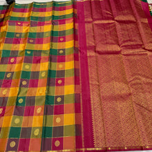 Saranga- Gorgeous Palum Pazhamum Checks With rudrakshapet borders with beautiful paisleys and chakram buttas woven body with neli veldhari horizontally and vertically checked body with rich arakku pallu and contrast beautifully woven blouse