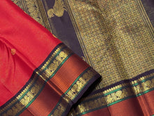 Stunning Red with Coffee Brown Vairaoosi with Buttas and Doublepet Meenakari Matte Finish Borders in Jari and Silk threads in a Pure Jari Handwoven Kanjivaram Silk with super gorgeous Kalakshetra kilis woven pallu and a very beautiful contrast blouse.