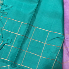 Sahana-Mesmerizing Lavendar with Turquoise Green Brocade Handwoven Pure Jari Kanjivaram with Jari checked borders with peacocks woven with rich turquoise pallu and contrast woven blouse.
