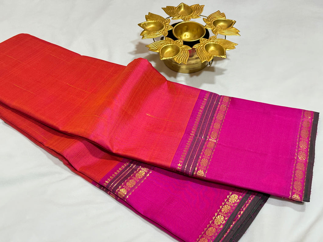 Double tone Orange with Pink with Mallimoggu Buttas and Doublepet Borders in a Handwoven Pure Kanjivaram Silk Saree Beauty