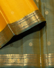 Sahana- Gorgeous Golden Yellow with Dual tone Green Buttas Handwoven Pure Kanjivaram Silk with small beautiful borders rich pallu and contrast woven blouse