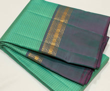 Sahana- Beautiful Turquoise Green with Teal Shot Purple  Muthukattam Handwoven Pure Jari Kanjivaram Silk with beautiful body spaced borders rich pallu and contrast woven blouse