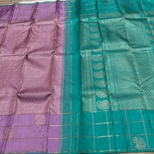 Sahana-Mesmerizing Lavendar with Turquoise Green Brocade Handwoven Pure Jari Kanjivaram with Jari checked borders with peacocks woven with rich turquoise pallu and contrast woven blouse.