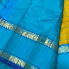 Sarasangi-Gorgeous Golden Lemon Sampanga with Sky Blue handwoven pure Jari Korvai Kanjivaram Silk with beautiful checked body with rich rettapet borders with deep blue jamudu , seer rich pallu and contrast woven blue blouse