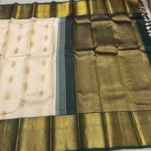 Stunning Ivory white with bottlegreen Handwoven Pure Jari Korvai Kanjivaram Silk Saree with gorgeous Gandaberunda motifs woven body rich borders pallu and contrast woven blouse