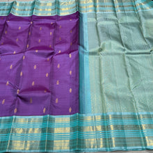 Lilac with Turquoise Blue Handwoven Pure Jari Korvai with Buttas and Varisai borders rich pallu and contrast woven blouse beauty