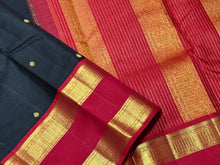 Vaibhogam -Stunning Black with Red Handwoven Pure Jari Kai Korvai Kanjivaram Silk Saree with Doublepet Borders woven body with beautiful small buttas woven all over with rich pallu and contrast woven blouse