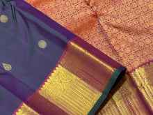 Sahana- Gorgeous Dual tone Manthulir Green with Rustic Orange Handwoven Pure Jari Kanjivaram Silk with beautiful buttas woven body rich mayilkan and chakram woven borders gorgeous pallu and contrast woven blouse