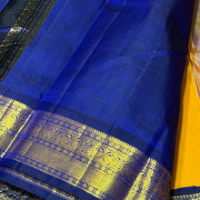 Vaibhogam- Stunning Mustard with MS Blue Buttas Handwoven Pure Jari Korvai Kanjivaram Silk with beautiful borders rich pallu and contrast woven blue blouse beauty