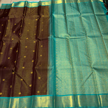 Vaibhogam- Gorgeous Coffee Brown with Turquoise Blue Handwoven Pure Jari Korvai Kanjivaram Silk with Vairaoosi woven body with mayil chakram buttas beautiful rich pallu and contrast oosi woven blouse