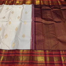 Vaibhogam-Mesmerizing Offwhite with Deep Maroonish Brown Handwoven Pure Jari Korvai Kanjivaram Silk with beautiful buttas gorgeous varisaipet borders rich pallu and contrast woven blouse