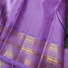 Vaibhogam- Gorgeous Deep Emerald Green with Lavendar  Korvai Handwoven Pure Jari Kanjivaram Silk with Vairaoosi Body with beautiful borders rich pallu and contrast Vairaoosi woven lavendar blouse