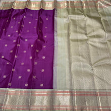 Deep Purple with Elakka Green in Kai Korvai Buttas Kanjivaram Silk Saree with beautiful diamonds and rudrakshas woven body intricate thambalam motifs woven borders rich pallu and contrast woven blouse