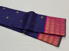 Vaibhogam- Stunning Deep Blue with Fuchsia Pink Handwoven Pure Jari Korvai Kanjivaram Silk with beautiful buttas woven body with rich varisaipet borders beautiful pallu and contrast woven blouse with green selvedges