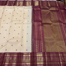 Vaibhogam- Gorgeous Offwhite with Maroonish Brown Handwoven Pure 2g jari Korvai with Buttas Kanjivaram Silk with beautiful thread kamalam buttas woven body with rich varisaipet small elephants and neli veldhari borders rich pallu and contrast woven blouse